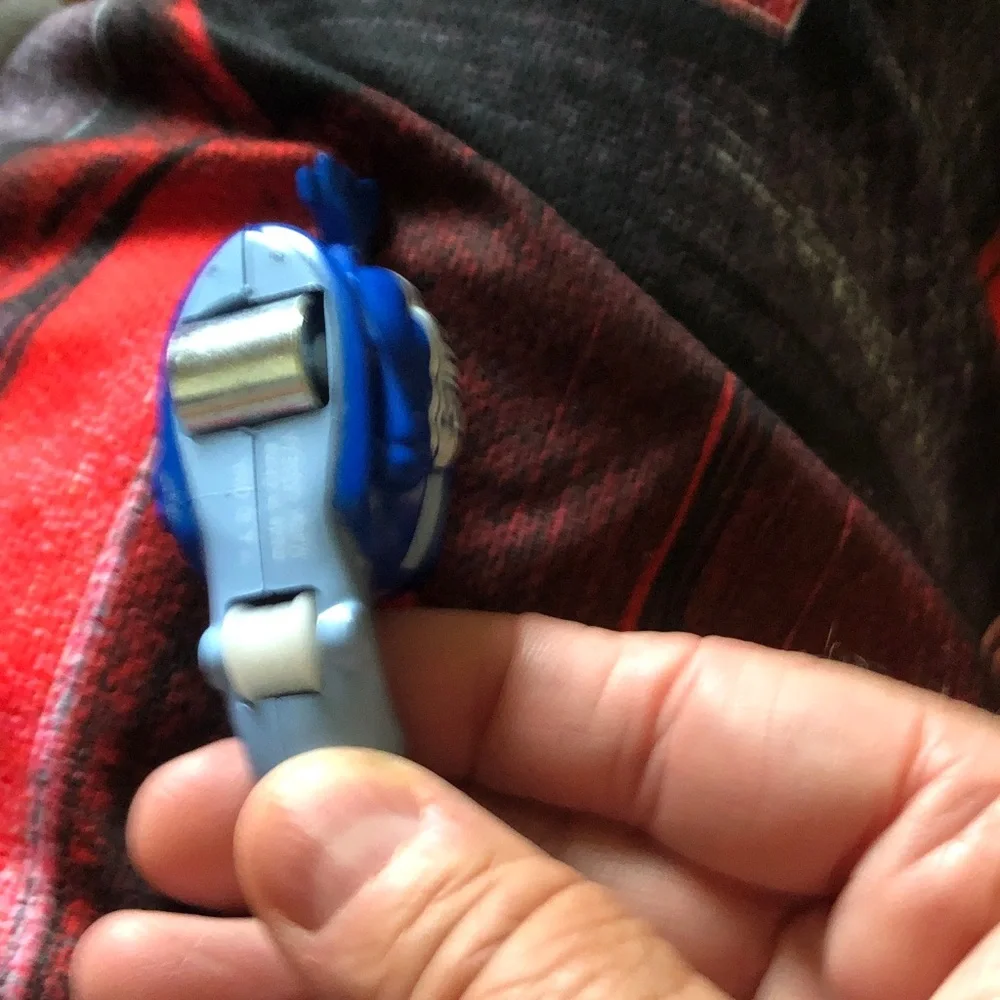 Blue Toy Helicopter with Red Rotor